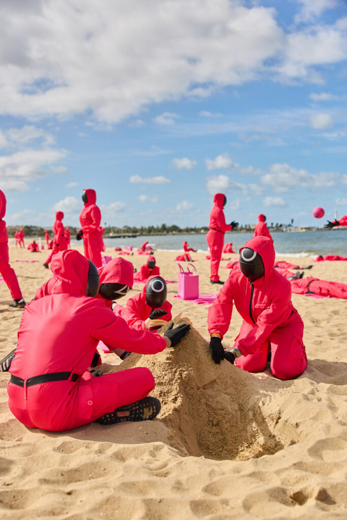 Squid Game Global Domination - 200 Pink Guards Takeover St Kilda Beach