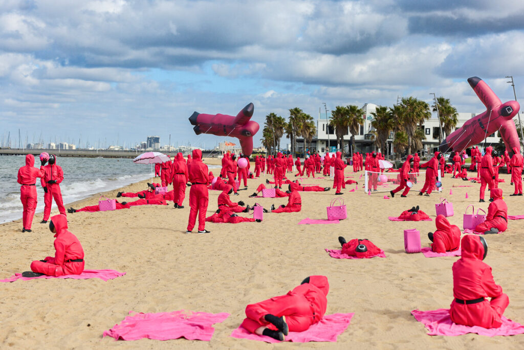 Squid Game Global Domination - 200 Pink Guards Takeover St Kilda Beach
