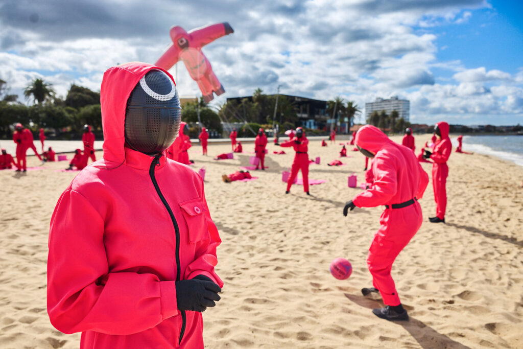 Squid Game Global Domination - 200 Pink Guards Takeover St Kilda Beach