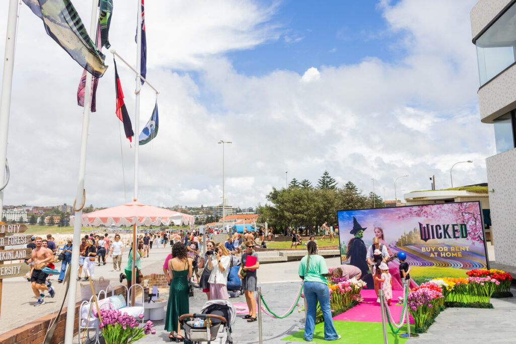 MOVIE | Wicked arrives at Bondi with 'Summer in Oz'