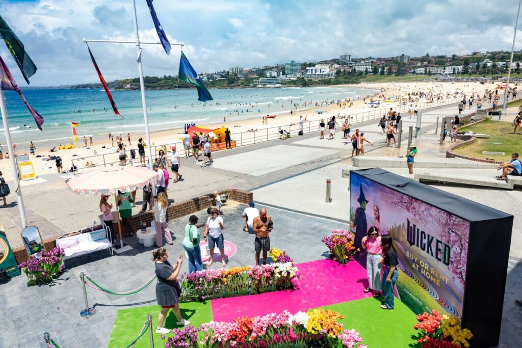 MOVIE | Wicked arrives at Bondi with 'Summer in Oz'
