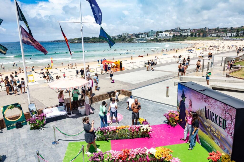 MOVIE | Wicked arrives at Bondi with 'Summer in Oz'