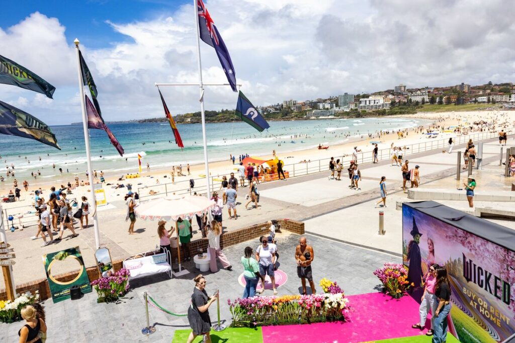 MOVIE | Wicked arrives at Bondi with 'Summer in Oz'