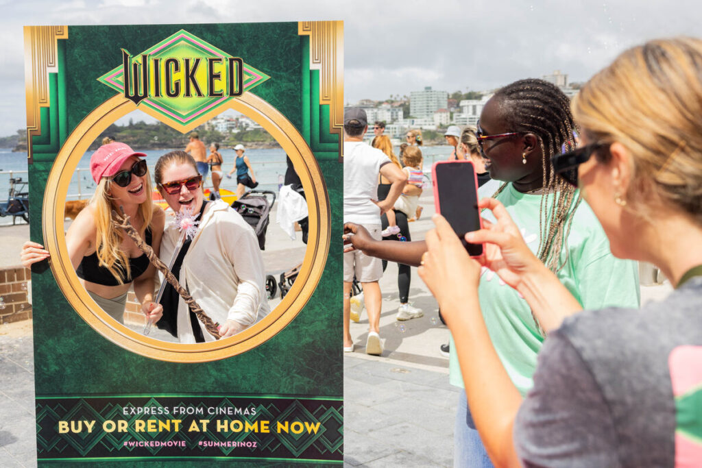 MOVIE | Wicked arrives at Bondi with 'Summer in Oz'