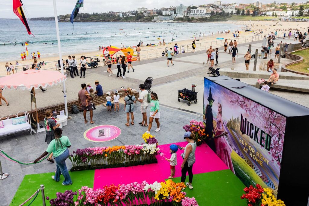 MOVIE | Wicked arrives at Bondi with 'Summer in Oz'