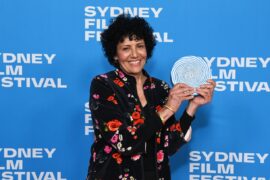 Fadia Abboud holds the 2026 Sydney UNESCO City of Film Award at the Sydney Film Festival Closing Night Gala.