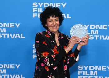Fadia Abboud holds the 2026 Sydney UNESCO City of Film Award at the Sydney Film Festival Closing Night Gala.
