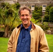 Monty Don standing in a historic British garden in Monty Don’s British Gardens on ABC TV.