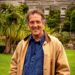 Monty Don standing in a historic British garden in Monty Don’s British Gardens on ABC TV.