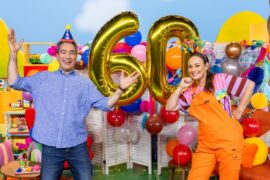 Play School presenters celebrate the programme's 60th anniversary alongside giant gold number 60 balloons.