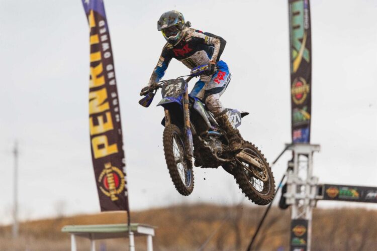 A motocross rider launches through the air during ProMX 2026 Round 5 at Appin, New South Wales.