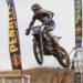 A motocross rider launches through the air during ProMX 2026 Round 5 at Appin, New South Wales.