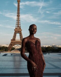 The cast of The Odyssey gathers in Paris beneath the Eiffel Tower for a twilight photo shoot.