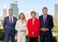 7NEWS Perth presenters standing in front of the Perth city skyline