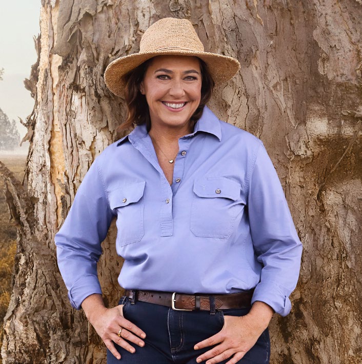 Lisa Millar stands beside a tree in Back Roads Candelo from season 12.