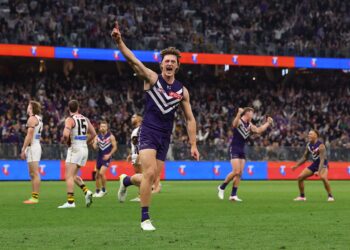 Fremantle player celebrates during an AFL match at Optus Stadium