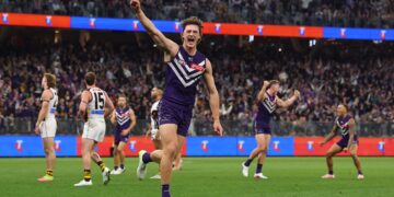 Fremantle player celebrates during an AFL match at Optus Stadium