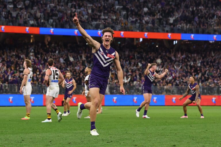 Fremantle player celebrates during an AFL match at Optus Stadium