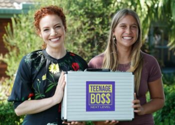 Emma Watkins with a Teenage Boss: Next Level participant holding a show-branded case