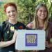 Emma Watkins with a Teenage Boss: Next Level participant holding a show-branded case