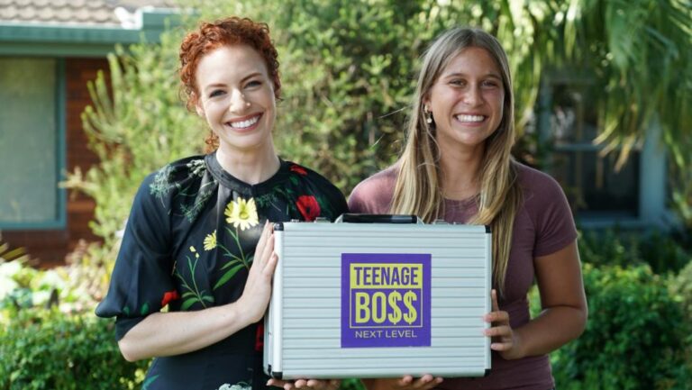 Emma Watkins with a Teenage Boss: Next Level participant holding a show-branded case