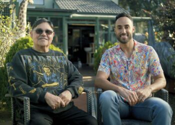 Uncle Michael McLeod and By Mob For Mob presenter Matty Mills seated outdoors