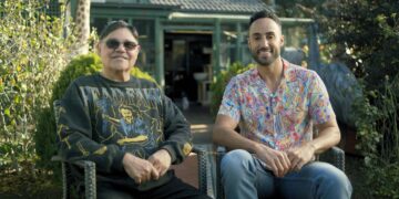 Uncle Michael McLeod and By Mob For Mob presenter Matty Mills seated outdoors