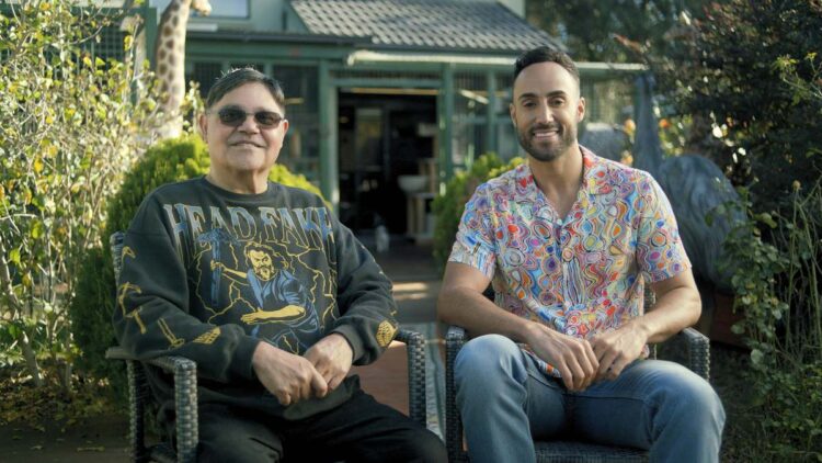 Uncle Michael McLeod and By Mob For Mob presenter Matty Mills seated outdoors