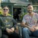 Uncle Michael McLeod and By Mob For Mob presenter Matty Mills seated outdoors