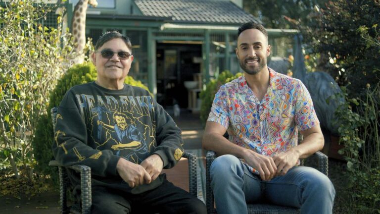 Uncle Michael McLeod and By Mob For Mob presenter Matty Mills seated outdoors