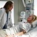 Amy treats Joan in Doc season 2 episode 20 The Big Chair