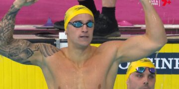 Flynn Southam celebrates after winning the men's 100m freestyle at Glasgow 2026.