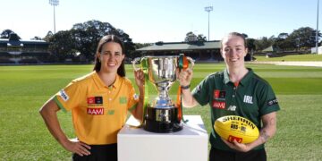 Australia and Ireland AFLW representatives with the Australia v Ireland Cup at North Sydney Oval.
