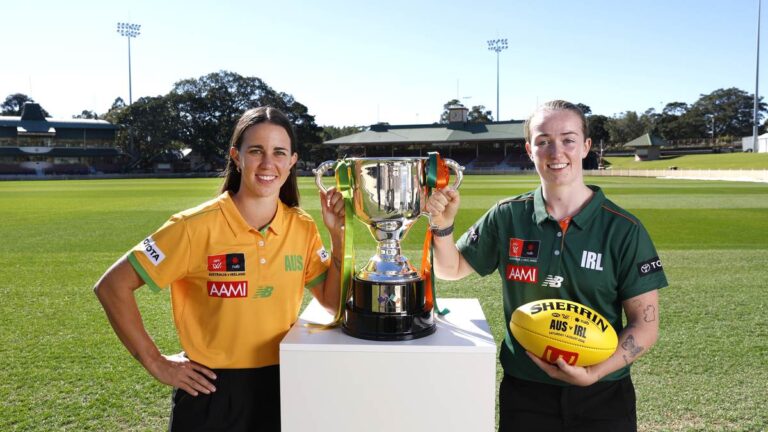 Australia and Ireland AFLW representatives with the Australia v Ireland Cup at North Sydney Oval.