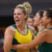 Australian netball players celebrate during a Commonwealth Games-style match.