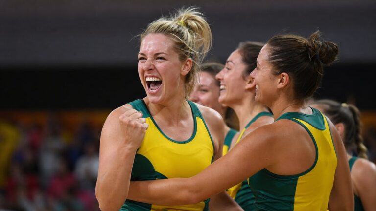 Australian netball players celebrate during a Commonwealth Games-style match.