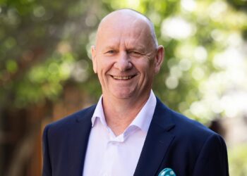 Ken Hinkley pictured with a Kayo Sports football