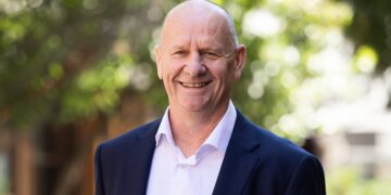 Ken Hinkley pictured with a Kayo Sports football