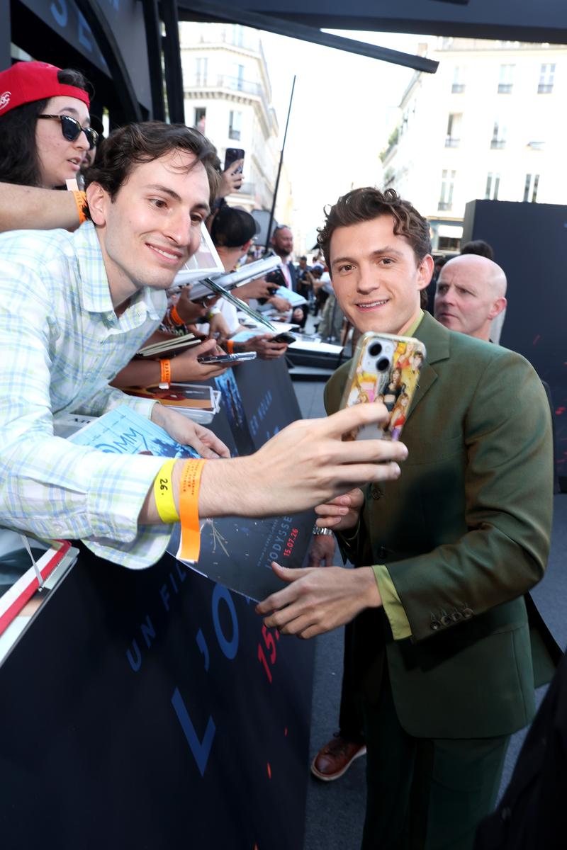 Tom Holland greets fans at The Odyssey Paris premiere