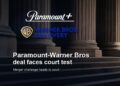 Paramount+ and Warner Bros. Discovery official logos over a courthouse background for the Paramount-Warner Bros deal court test story.
