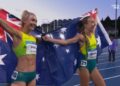 Rose Davies and Jess Hull celebrate their Glasgow 2026 5000m one-two with Australian flags