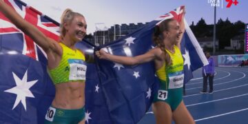 Rose Davies and Jess Hull celebrate their Glasgow 2026 5000m one-two with Australian flags