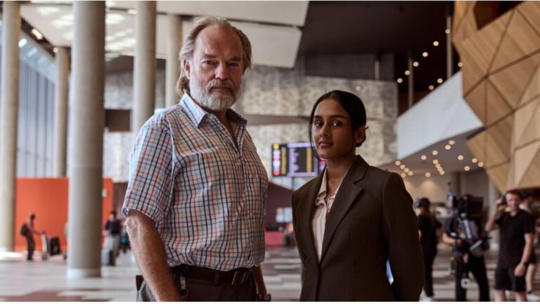 Hugo Weaving and Shabana Azeez in The Airport Chaplain