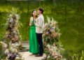 Zac and Maya from Farmer Wants A Wife 2026 standing together beside a lake