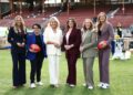 Jess Webster, Chyloe Kurdas, Lauren Wood, Kelli Underwood, Lauren Arnell and Taylor Smith at an AFL ground