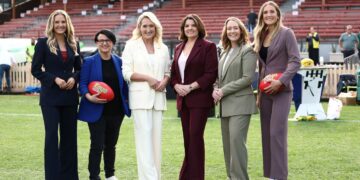 Jess Webster, Chyloe Kurdas, Lauren Wood, Kelli Underwood, Lauren Arnell and Taylor Smith at an AFL ground