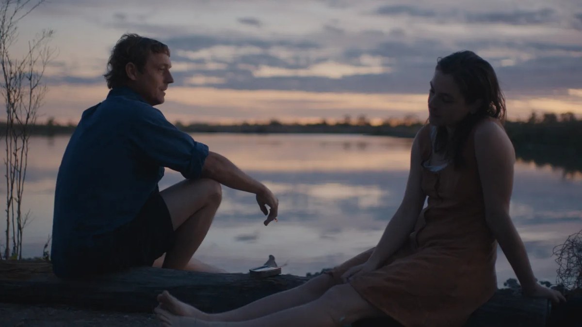 Two people sit near water in imagery from MUBI September 2026 special collections.