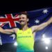 Kurtis Marschall celebrates with the Australian flag at the Glasgow 2026 Commonwealth Games