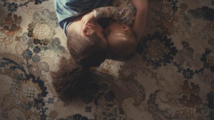 Calida and her child in the Australian short documentary When The Ground Paused