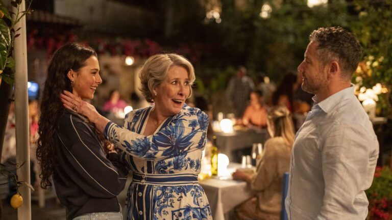 Three characters together at an Italian restaurant in A Taste For Murder